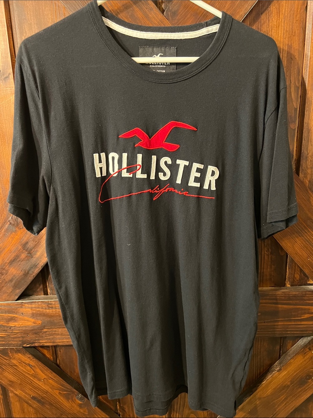 Hollister Black Tee with Red and White Logo